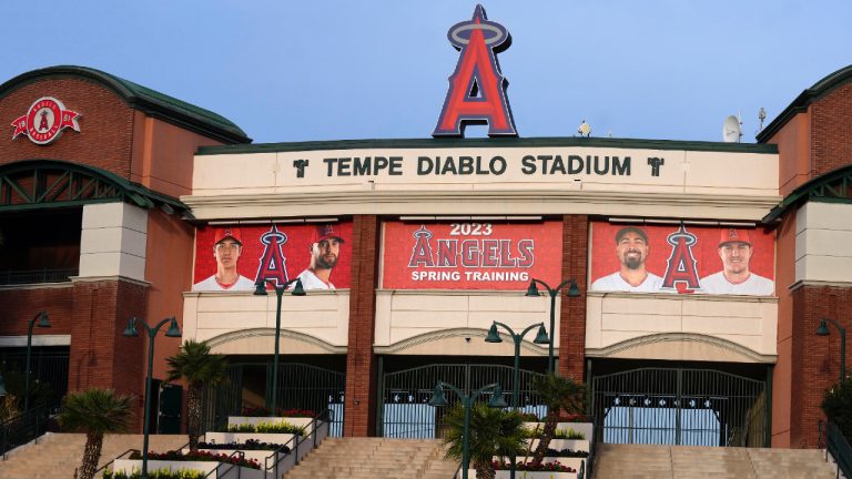 After the Los Angeles Dodgers signing of former Los Angeles Angels player Shohei Ohtani, left, his image still adorns the Angels' Tempe Diablo Stadium, sharing the prominent spot with pitcher Patrick Sandoval, second from left, infielder Anthony Rendon, second from right, and outfielder Mike Trout, right, at the spring training home of the Angels, Monday, Dec. 11, 2023, in Tempe, Ariz. The Angels have already removed the Ohtani photo banner at the Angels regular season stadium. (Ross D. Franklin/AP)