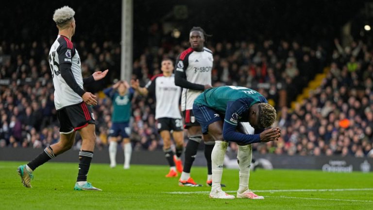 Arsenal's Bukayo Saka reacts after missing a chance to score during the English Premier League soccer match between Arsenal and Fulham at Craven Cottage stadium in London, Sunday, Dec. 31, 2023. (Alastair Grant/AP Photo)