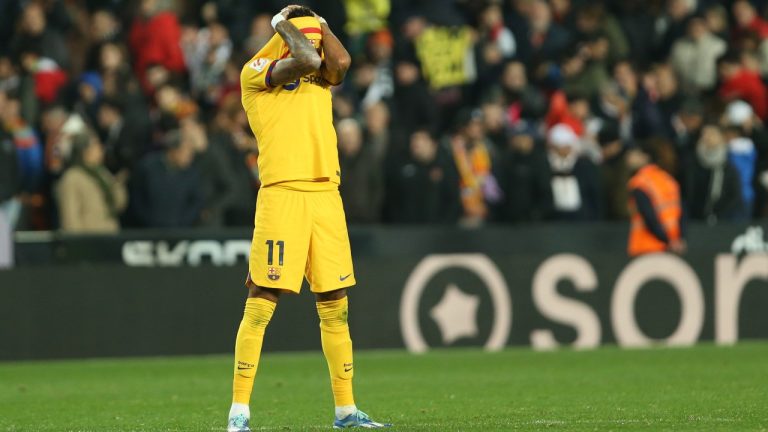 Barcelona's Raphinha reacts after the Spanish La Liga soccer match between Valencia and Barcelona at the Mestalla stadium in Valencia. (Alberto Saiz/AP)