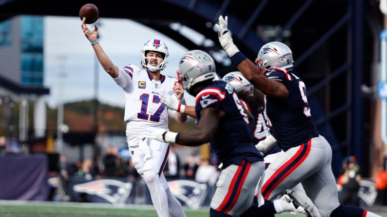 Buffalo Bills quarterback Josh Allen throws a pass under pressure during the second half of an NFL football game against the New England Patriots, Sunday, Oct. 22, 2023, in Foxborough, Mass. (Winslow Townson/AP Photo)