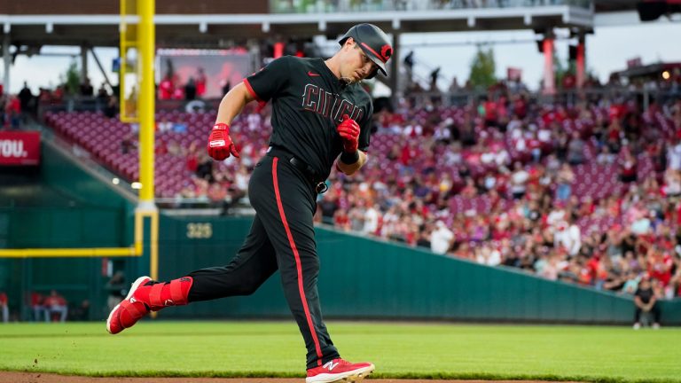 Cincinnati Reds' Hunter Renfroe rounds third base after hitting a 2-run home run during the third inning of a baseball game, Friday, Sept. 8, 2023, in Cincinnati. (Joshua A. Bickel/AP)