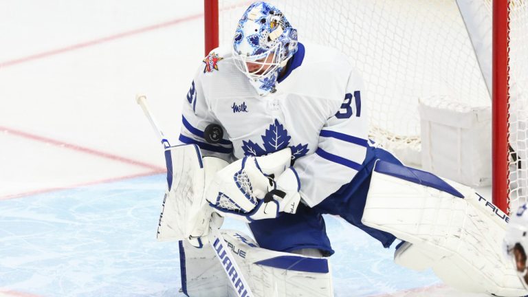 Toronto Maple Leafs goaltender Martin Jones (31) makes a save during the third period of an NHL hockey game against the Buffalo Sabres on Thursday, Dec. 21, 2023, in Buffalo, N.Y. (Jeffrey T. Barnes/AP)