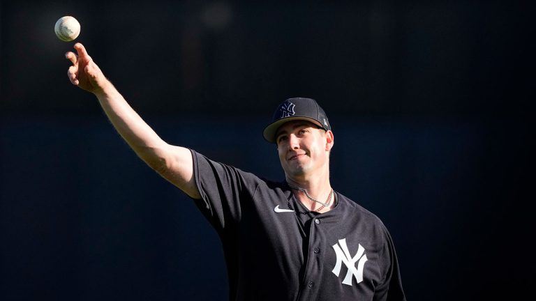 New York Yankees pitcher Mitch Spence throws during a spring training baseball workout Saturday, Feb. 18, 2023, in Tampa, Fla. (David J. Phillip/AP)