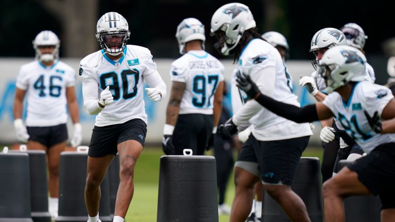 Carolina Panthers defensive end Amare Barno (90) runs a drill during NFL football practice, Wednesday, June 14, 2023, in Charlotte, N.C. (Erik Verduzco/AP)