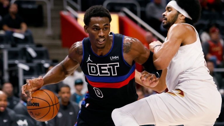 Detroit Pistons center Jalen Duren (0) drives against Cleveland Cavaliers center Jarrett Allen during the first half of an NBA basketball game Saturday, Dec. 2, 2023, in Detroit. (Duane Burleson/AP)