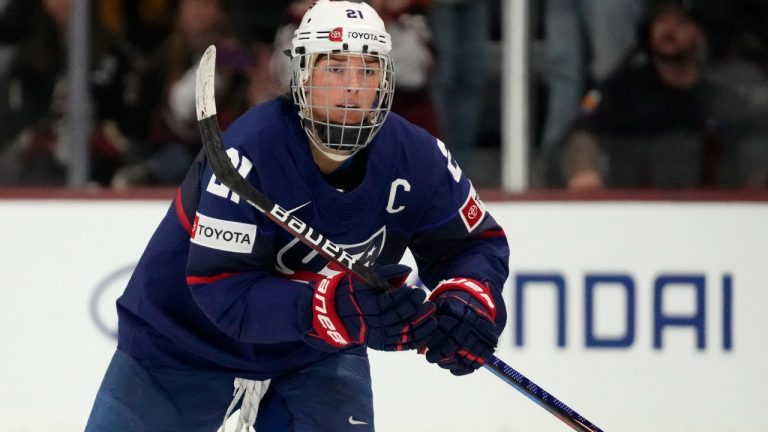 United States forward Hilary Knight skates to the bench to celebrate her goal against Canada during the first period of a rivalry series women's hockey game Wednesday, Nov. 8, 2023, in Tempe, Ariz. (Ross D. Franklin/AP)
