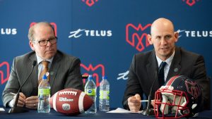 Jason Maas, right, speaks during a news conference alongside Montreal Alouettes General Manager Danny Maciocia in Montreal, Tuesday, December 20, 2022. (Graham Hughes/CP)