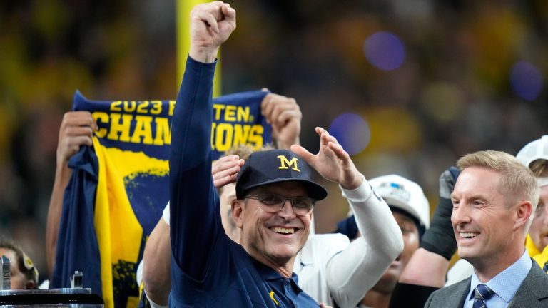 Michigan head coach Jim Harbaugh celebrates after the Big Ten championship NCAA college football game against Iowa, Saturday, Dec. 2, 2023, in Indianapolis. Michigan won 26-0. (AJ Mast/AP)