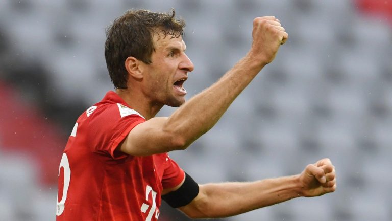 Bayern Munich's Thomas Muller celebrates after scoring his side's second goal during the German Bundesliga soccer match between Bayern Munich and Eintracht Frankfurt. (Andreas Gebert/pool via AP)