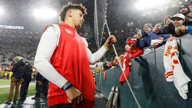 Kansas City Chiefs quarterback Patrick Mahomes (15) with fans before an NFL football game against the Green Bay Packers Sunday, Dec. 3, 2023, in Green Bay, Wis. (Jeffrey Phelps/AP Photo)