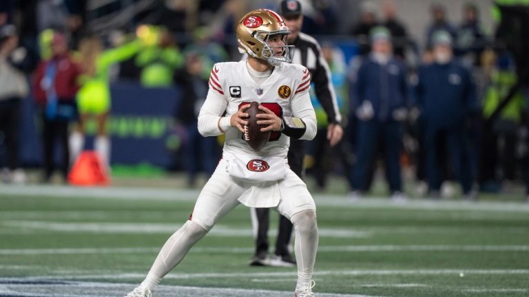 San Francisco 49ers quarterback Brock Purdy drops back to pass during an NFL football game against the Seattle Seahawks, Thursday, Nov. 23, 2023, in Seattle. The 49ers won 31-13. (Stephen Brashear/AP)