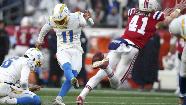 Los Angeles Chargers place kicker Cameron Dicker (11) kicks a field goal during the first half of an NFL football game against the New England Patriots, Sunday, Dec. 3, 2023, in Foxborough, Mass. (Steven Senne/AP)