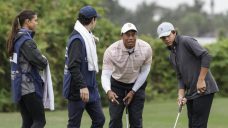Kuchar, son build three-shot lead; Tiger and son have to settle for a nice family affair