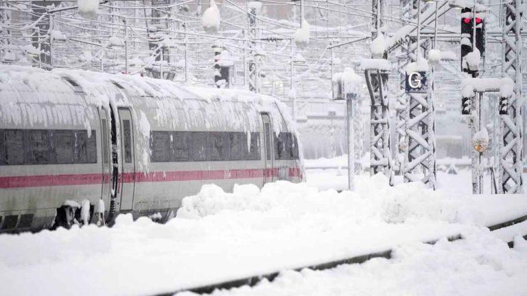A train is parked at the central station after heavy snow fall in Munich. (Matthias Schrader/AP)