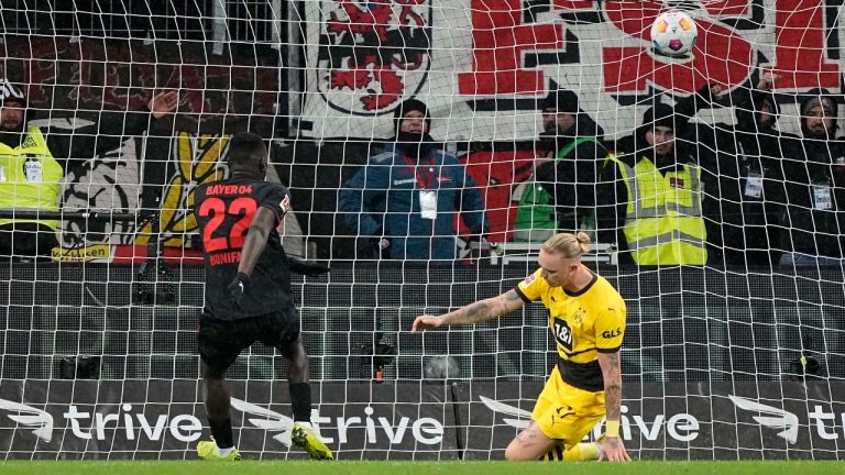 Leverkusen's Victor Boniface scores his side's opening goal during the German Bundesliga soccer match between Bayer Leverkusen and Borussia Dortmund at the BayArena in Leverkusen, Germany, Sunday, Dec. 3, 2023 (Martin Meissner/AP)