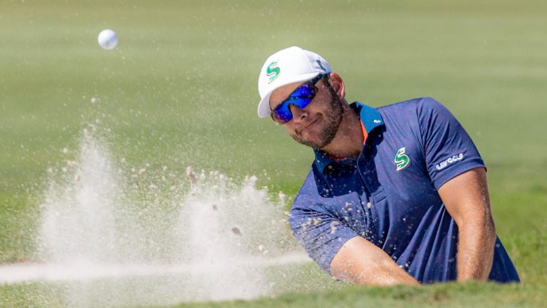 Dean Burmester of Stinger GC hits his shot from a bunker on the eighth hole during the semifinals of the LIV Golf Team Championship Miami at the Trump National Doral on Saturday, Oct. 21, 2023 in Doral, Fla. (Photo by Jon Ferrey/LIV Golf via AP)