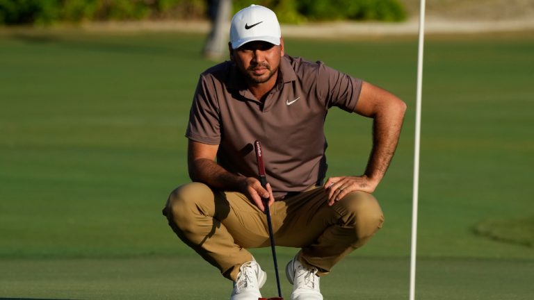 Jason Day, of Australia, studies his putt at the 18th green during the first round of the Hero World Challenge PGA Tour at the Albany Golf Club in New Providence, Bahamas, Thursday, Nov. 30, 2023. (Fernando Llano/AP)
