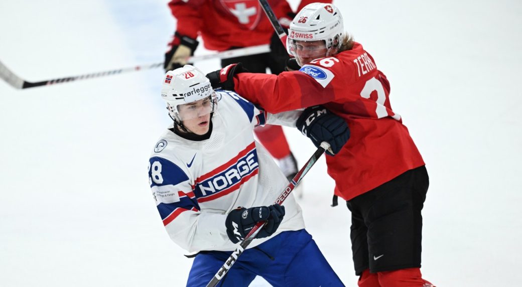 Switzerland tops Norway to reach quarterfinals at world juniors
