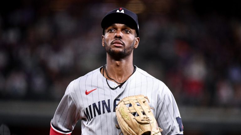 Minnesota Twins centre fielder Michael A. Taylor jogs off the field at the end of the fifth inning of a baseball game against the Colorado Rockies, Saturday, Sept. 30, 2023, in Denver. (Geneva Heffernan/AP)
