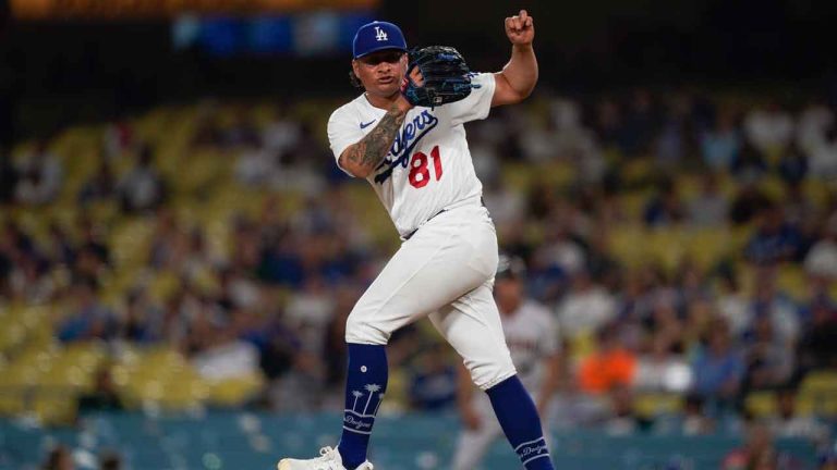 Los Angeles Dodgers relief pitcher Victor Gonzalez reacts after throwing a strike to an Arizona Diamondbacks batter during the ninth inning of a baseball game. (Ryan Sun/AP)