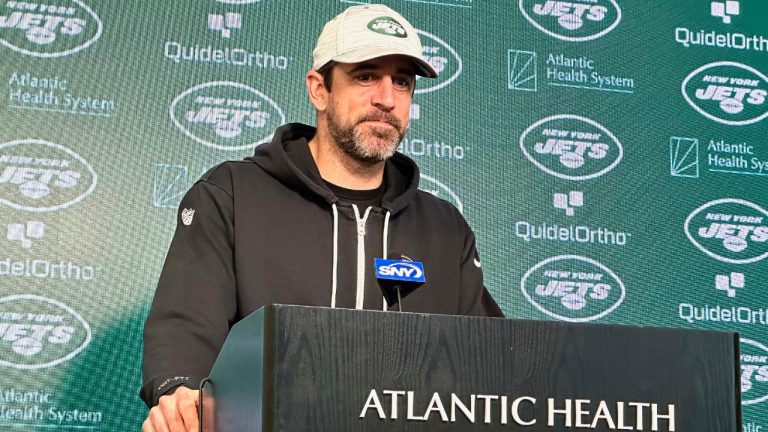 New York Jets quarterback Aaron Rodgers speaks to reporters at the team's NFL football facility in Florham Park, N.J., Monday, Jan. 8, 2023. (Dennis Waszak Jr./AP)