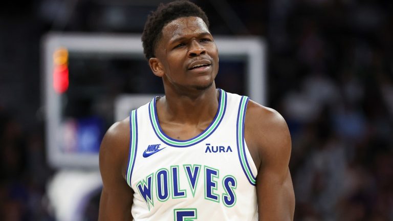 Minnesota Timberwolves guard Anthony Edwards (5) reacts during the first half of an NBA basketball game against the Los Angeles Lakers Saturday, Dec. 30, 2023, in Minneapolis. (AP Photo/Matt Krohn)