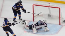 Merzlikins makes 21 saves as Blue Jackets blank Blues