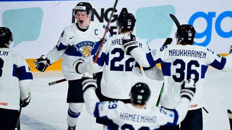 Finland's Jere Lassila celebrates after scoring his side's fourth goal during the in IIHF World Junior Championship ice hockey quarter final match between Slovakia and Finland at Froelundaborg in Gothenburg, Sweden, Tuesday, Jan. 2, 2024. (Bjoern Larsson Rosvall/TT News Agency via AP) 