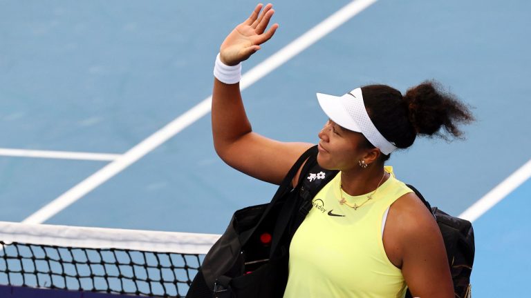 Naomi Osaka of Japan waves to the crowd after she lost her match against Karolina Pliskova of the Czech Republic during the Brisbane International tennis tournament in Brisbane, Australia, Wednesday, Jan. 3, 2024. (Tertius Pickard/AP)