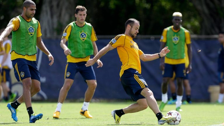 LA Galaxy MLS soccer teams Laurent Courtois, of France, drives during morning training session at Florida International University in Miami, Monday, Aug. 5, 2013. Chelsea will face Real Madrid in the final of the International Champions Cup at Miami on Wednesday, Aug. 7, 2013. AC Milan will take on the Los Angeles Galaxy in the third-place game earlier the same night. (Alan Diaz/AP)