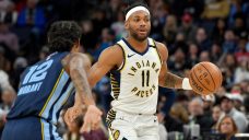 Brown buys No. 11 from new Raptors teammate Porter for $10K