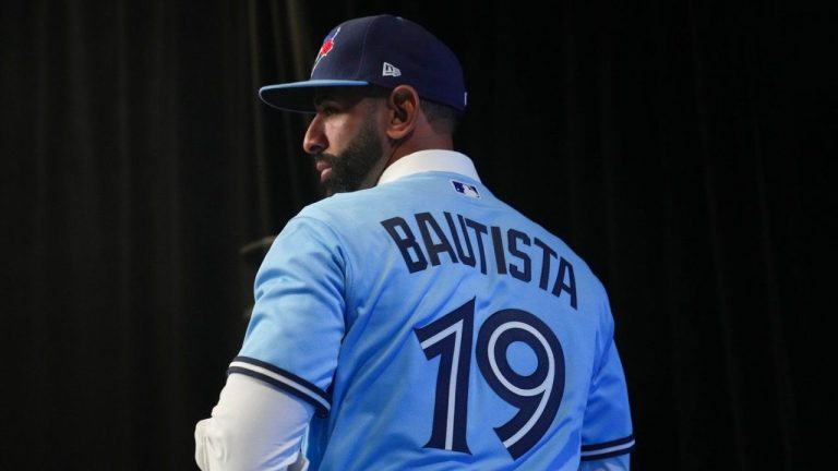 Former Toronto Blue Jays player Jose Bautista attends a news conference in a team shirt bearing his name, in Toronto, Friday, Aug. 11, 2023. (Chris Young/CP Photo)
