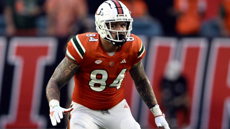 Miami's Cam McCormick follows the actionduring an NCAA football game on Saturday, Sept. 9, 2023, in Miami Gardens, Fla. McCormick enrolled in college in 2016. He might still be there in 2025. The Miami tight end announced Thursday, Jan. 17, 2024, that he will return to college for what is believed to be an unprecedented ninth season of eligibility, getting one final season from a career that was derailed multiple times by season-ending injuries. (Doug Murray/AP)