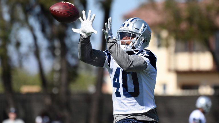 Running back Mike Weber Jr. catches a pass at the Dallas Cowboys' training camp in Oxnard, Calif., Saturday, July 27, 2019. (Michael Owen Baker/AP)