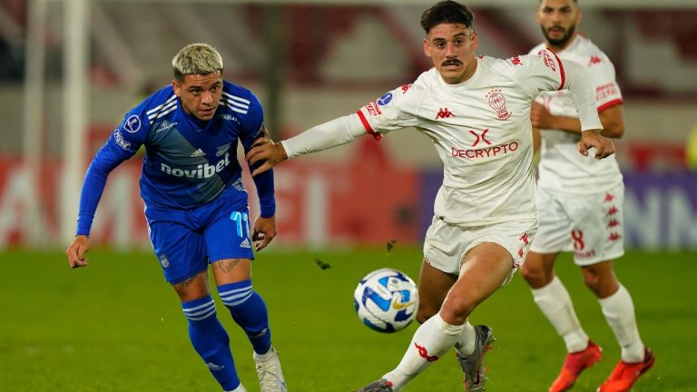 Matias Coccaro of Argentina's Huracan, right, and Diego Garcia of Ecuador's Emelec battle for the ball during a Copa Sudamericana Group B soccer match at Tomas Adolfo Duco stadium in Buenos Aires, Argentina, Thursday, May 25, 2023. (Ivan Fernandez/AP)