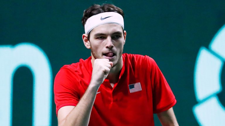 Taylor Fritz, of the United States, celebrates defeating Italy's Lorenzo Musetti during a Davis Cup quarter-final tennis match between Italy and USA in Malaga, Spain, Thursday, Nov. 24, 2022. (AP Photo/Joan Monfort)