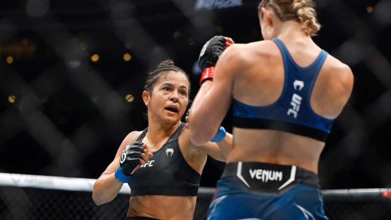 Natalia Silva pursues Andrea Lee during a UFC 292 mixed martial arts fight. (Gregory Payan/AP)