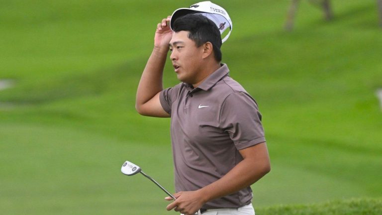 Kevin Yu tips his cap after finishing the first round on the North Course at Torrey Pines during the Farmers Insurance Open golf tournament Wednesday, Jan. 24, 2024, in San Diego. (Denis Poroy/AP Photo)
