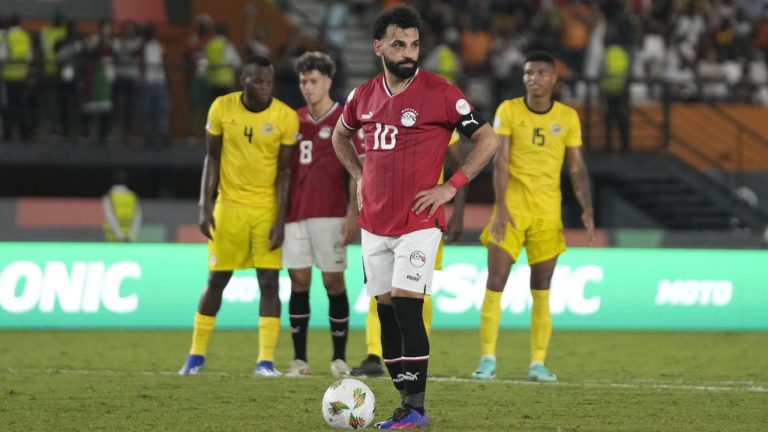 Egypt's Mohamed Salah wait to take a penalty, which he scores for his side second goal of the game during the African Cup of Nations Group B soccer match between Egypt and Mozambique in Abidjan, Ivory Coast, Sunday, Jan. 14, 2024. (Themba Hadebe/AP)