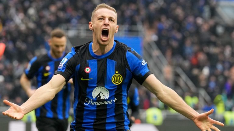 Inter Milan's Davide Frattesi celebrates after scoring his side's second goal during the Serie A soccer match between Inter Milan and Hellas Verona at the San Siro Stadium in Milan, Italy, Saturday, Jan. 6, 2024. (Antonio Calanni/AP)