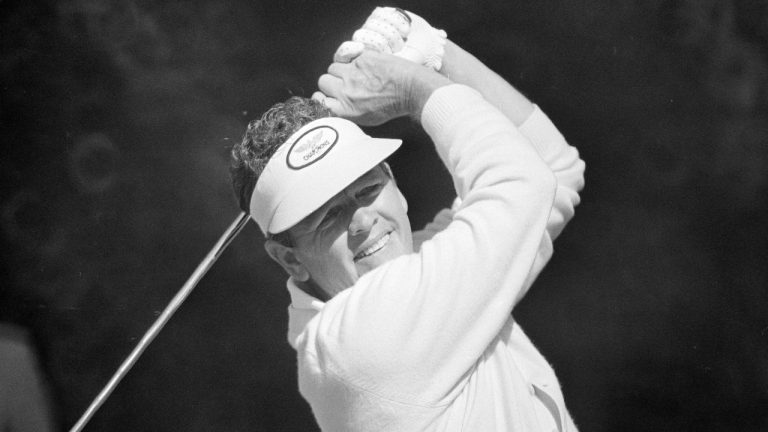 FILE - Former Masters champ Jack Burke tees off during a practice rounds at the Augusta National Golf Club in Augusta, Ga., April 11, 1974. Jack Burke Jr., the oldest living Masters champion who staged the greatest comeback ever at Augusta National for one of his two majors, died Friday morning, Jan. 19, 2024, in Houston. He was 100. (AP Photo/Paul Vathis, File)
