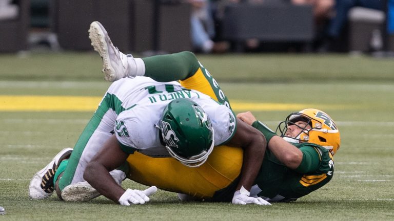 Saskatchewan Roughriders Anthony Lanier II (91) an Edmonton Elks quarterback during second half CFL action in Edmonton, Alta., on Sunday June 11, 2023. (Jason Franson./THE CANADIAN PRESS)