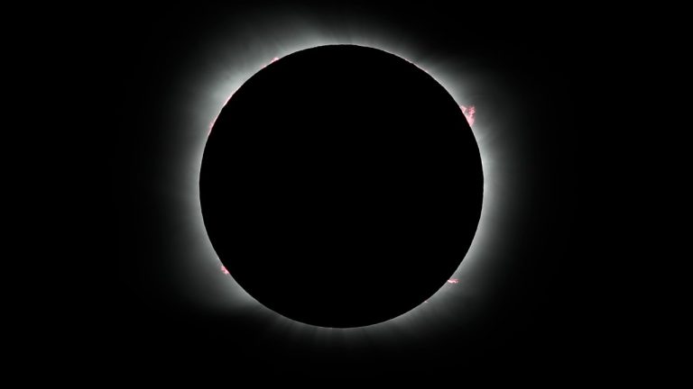 The moon covers the sun during a solar eclipse in Piedra del Aguila, Argentina, Monday, Dec. 14, 2020. (Natacha Pisarenko/AP Photo)