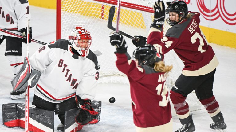 Montreal's Ann-Sophie Bettez (24) celebrates a goal by teammate Maureen Murphy (15) against Ottawa goaltender Emerance Maschmeyer during overtime PWHL hockey action in Laval, Que., Saturday, January 27, 2024. (Graham Hughes/CP)