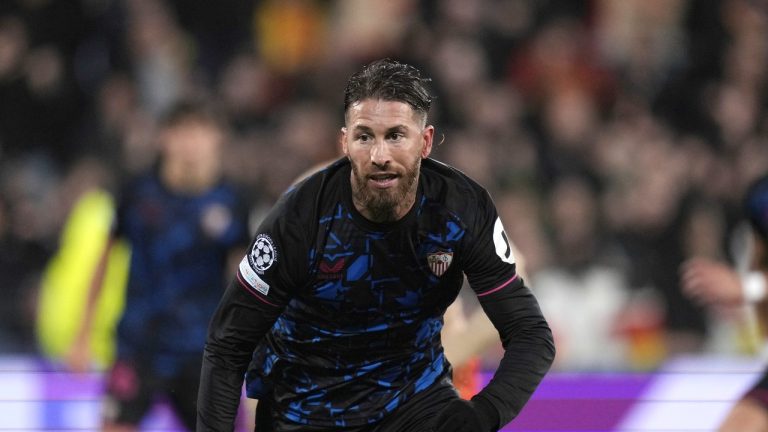 Sevilla's Sergio Ramos runs with the ball during the Champions League Group B soccer match between Lens and Sevilla at the Bollaert stadium in Lens, France, Tuesday, Dec. 12, 2023. (Thibault Camus/AP Photo)