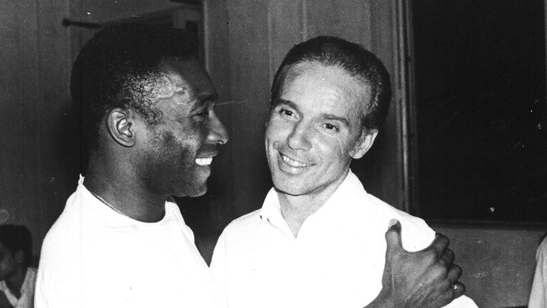 FILE - Brazil's soccer star Pele, left, embraces Mario Zagallo after the latter's appointment as coach of the Brazilian national soccer team, in Rio De Janeiro, Brazil, in March 1970. Zagallo, who reached the World Cup final a record five times, winning four, as a player and then a coach with Brazil, has died. He was 92. Brazilian soccer confederation president Ednaldo Rodrigues said in a statement in the early hours of Saturday, Jan. 5, 2024, confirming Zagallo's death that Zagallo "is one of the biggest legends" of the sport. (AP Photo, File)