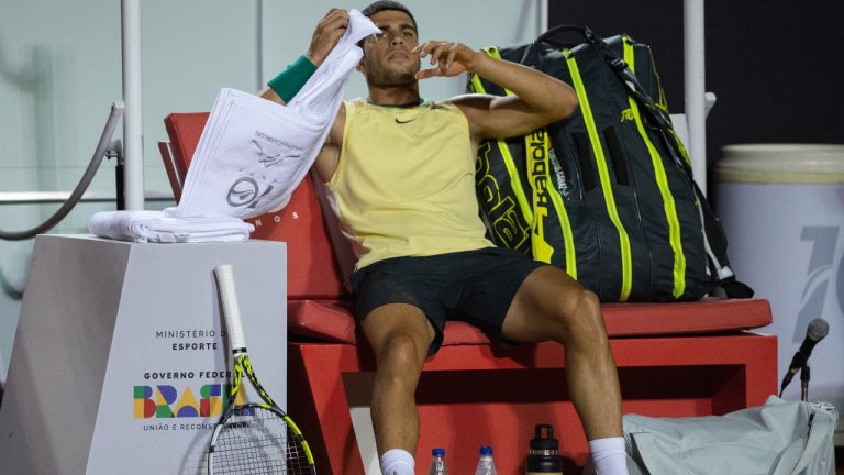 Carlos Alcaraz of Spain reacts after injuring his ankle during the Rio Open Tennis tournament in Rio de Janeiro, Brazil, Tuesday, Feb. 20, 2024. (AP Photo/Armando Paiva)