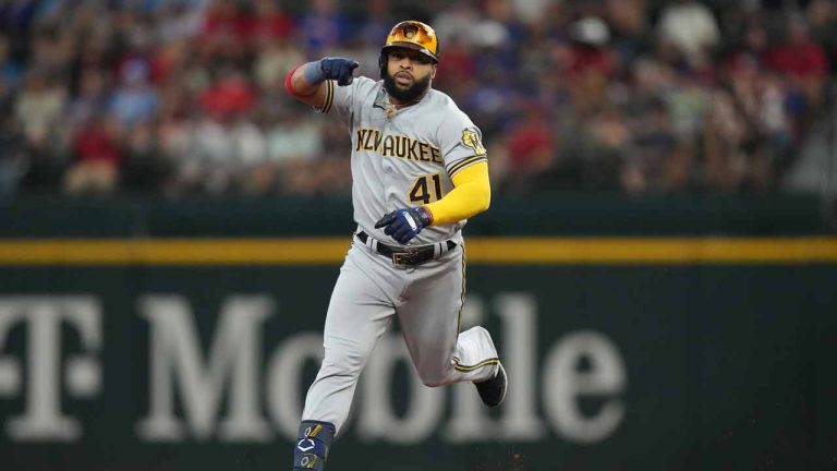 Milwaukee Brewers' Carlos Santana runs the bases after hitting a solo home run during the first inning of a baseball game against the Texas Rangers in Arlington, Texas, Saturday, Aug. 19, 2023. (LM Otero/AP)