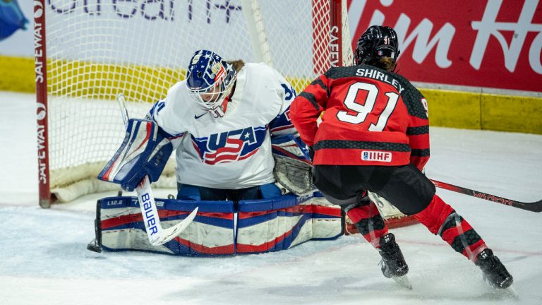United States goaltender Aerin Frankel (31) stops a shot from Canada's Sophie Shirley (91) during first period Rivalry Series women's hockey action in Regina, Friday, February 9, 2024. (Liam Richards/CP)