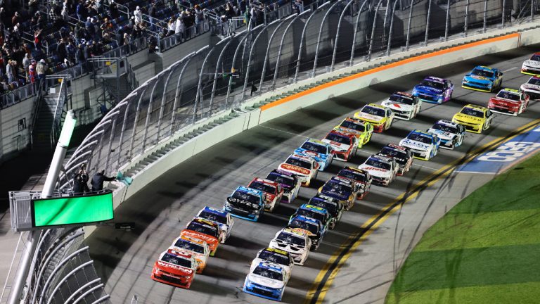 Jesse Love, front left, and Austin Hill, front right, lead the field to start the NASCAR Xfinity Series auto race at Daytona International Speedway, Monday, Feb. 19, 2024, in Daytona Beach, Fla. (David Graham/AP)